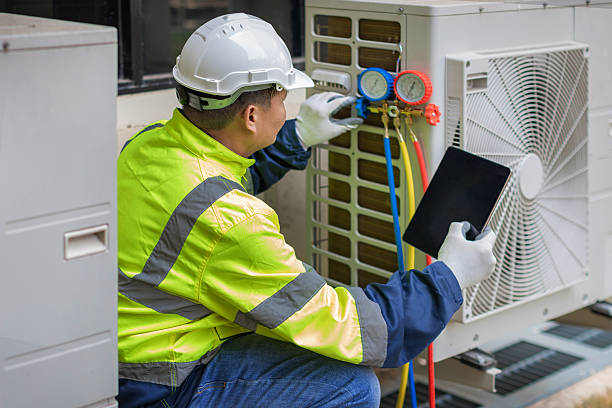 Professional Hvac technician working in Russellville, MO